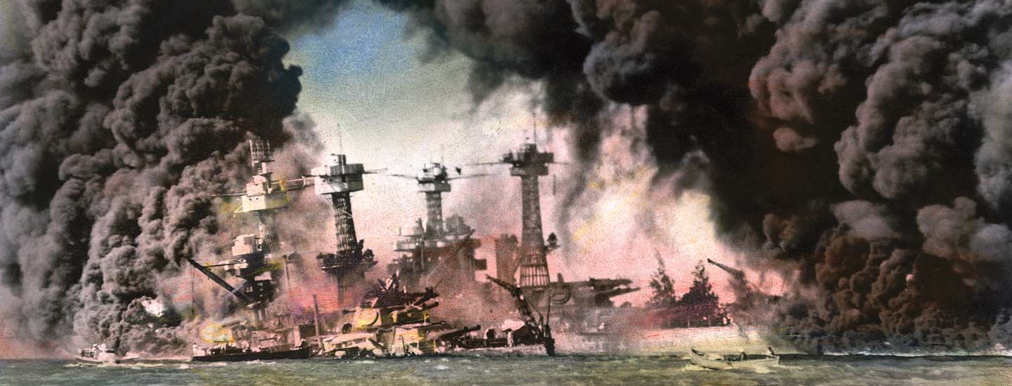 Battleships engulfed in flames and thick black smoke during an attack