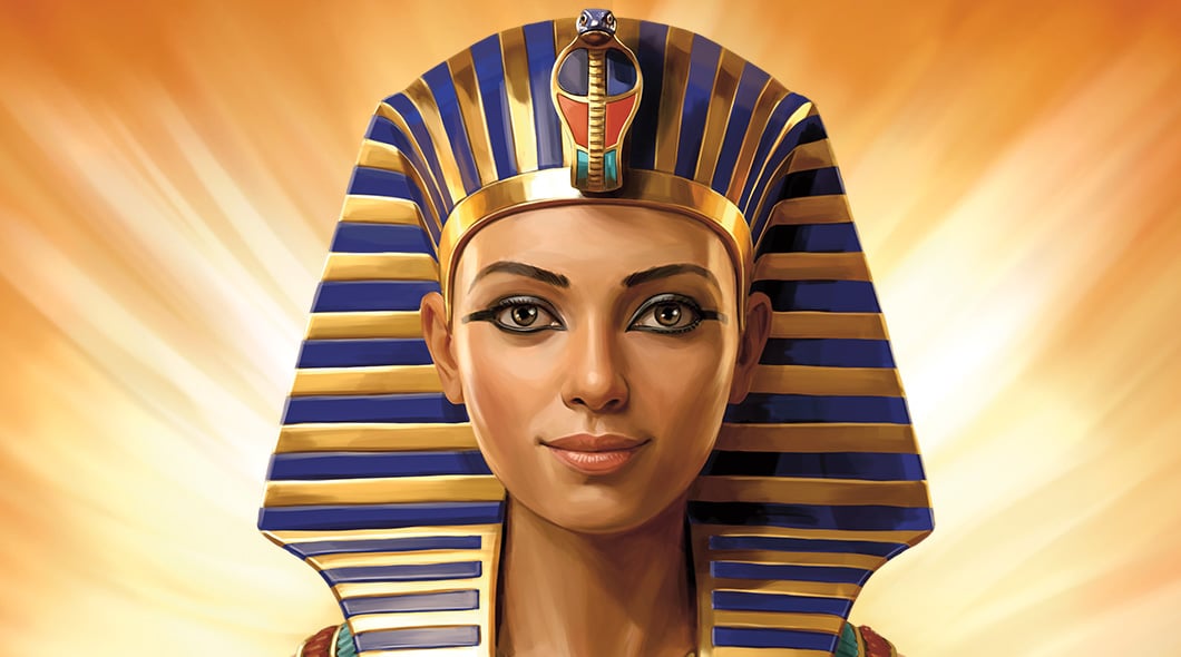 A person wears an ancient Egyptian pharaoh headdress with a gold and blue nemes and uraeus cobra