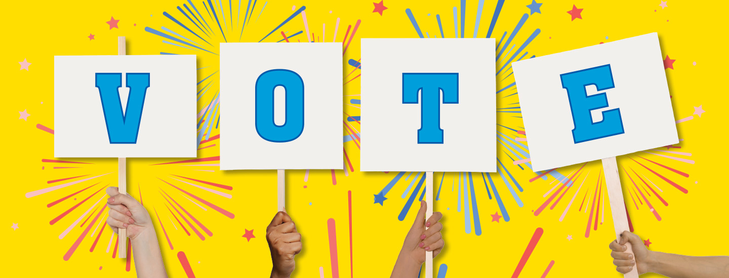 Four hands each hold a sign with one letter that together spell Vote
